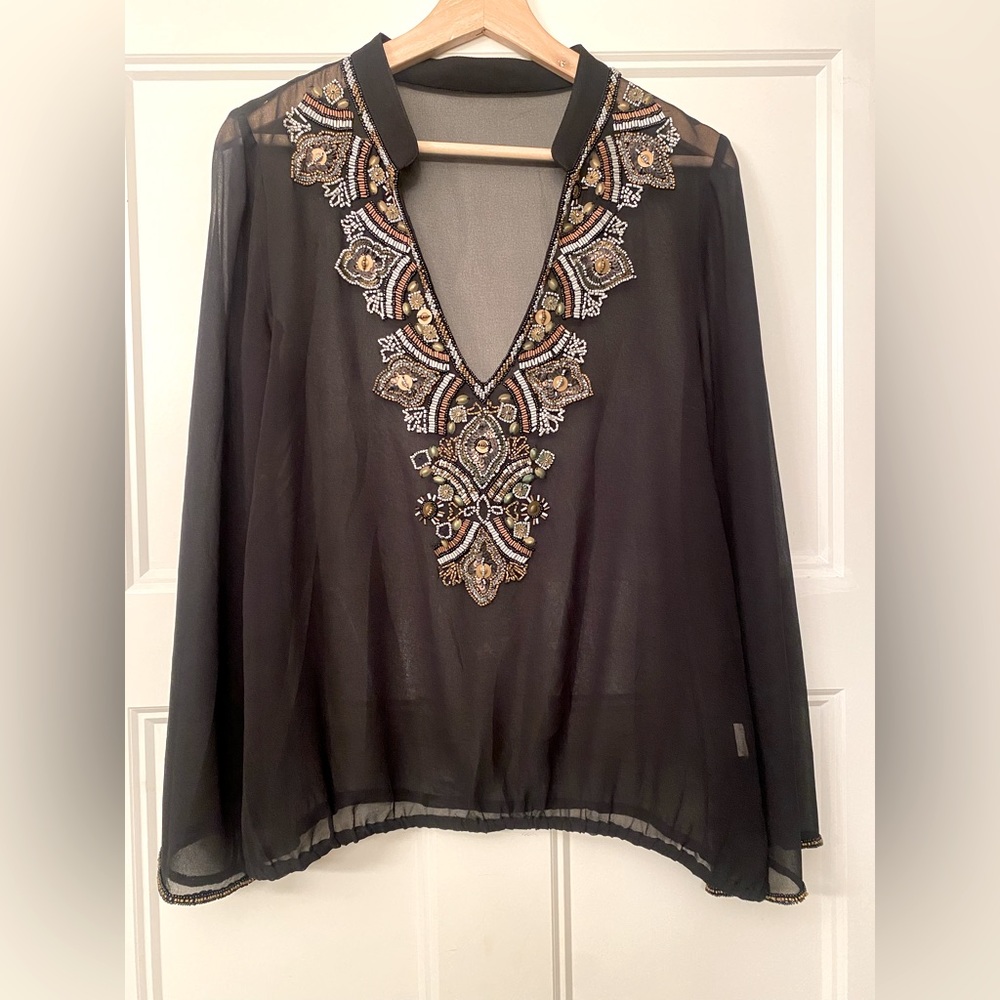 Transparent  blouse with rhinestones